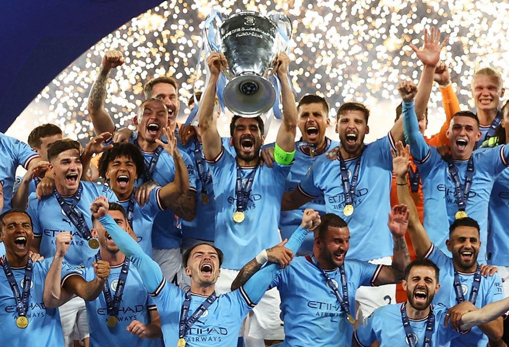 Manchester City's Ilkay Gundogan lifts the trophy