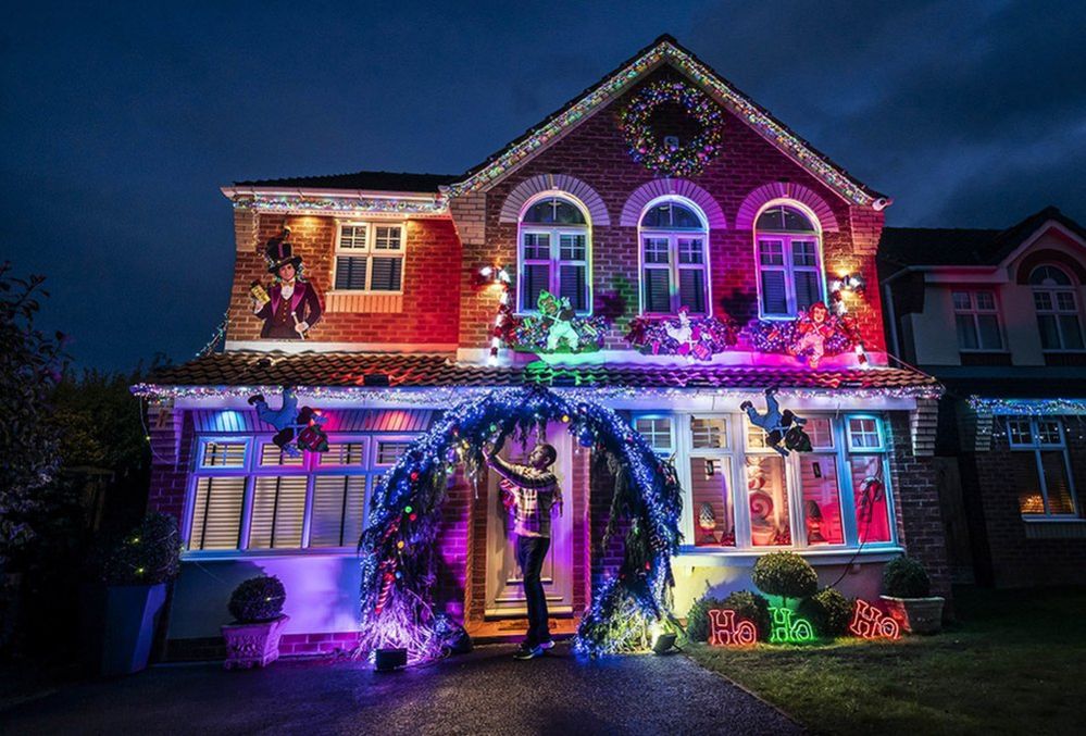 Michael Fenning puts the finish touches to his Wonka themed home in Doncaster, 8 December 2023