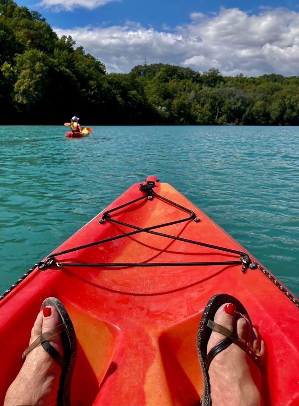A woman's feet on a kayak