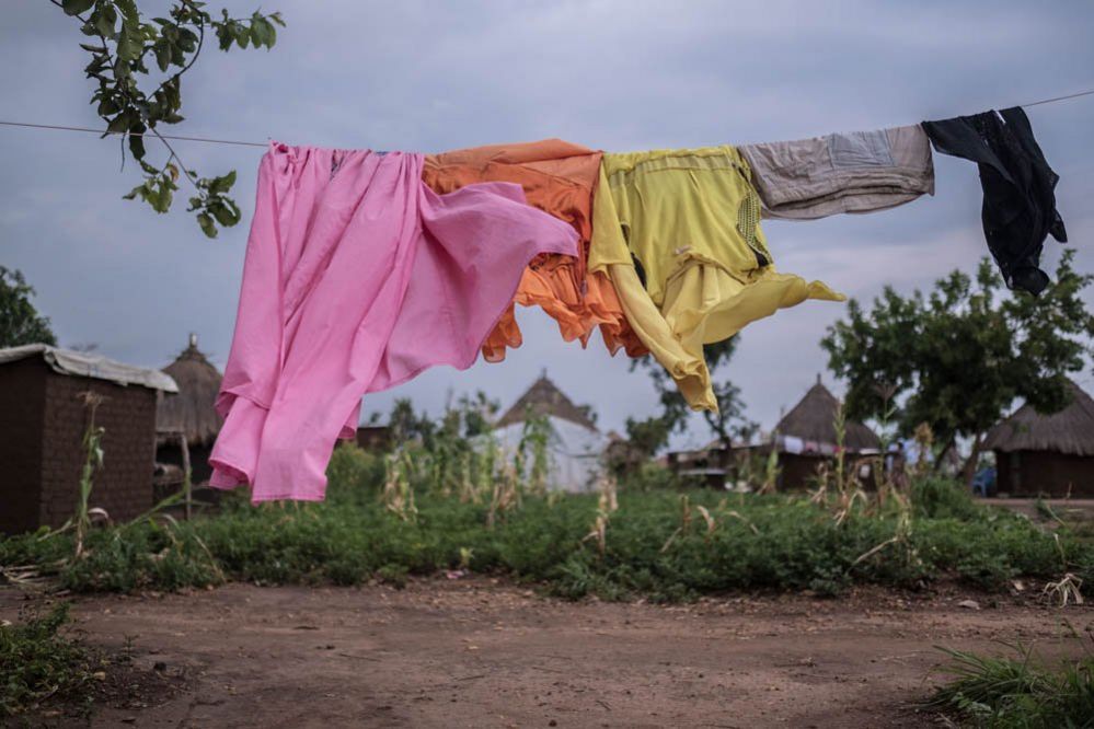 Clothes hang on a washing line in Palorinya refugee camp in northern Uganda