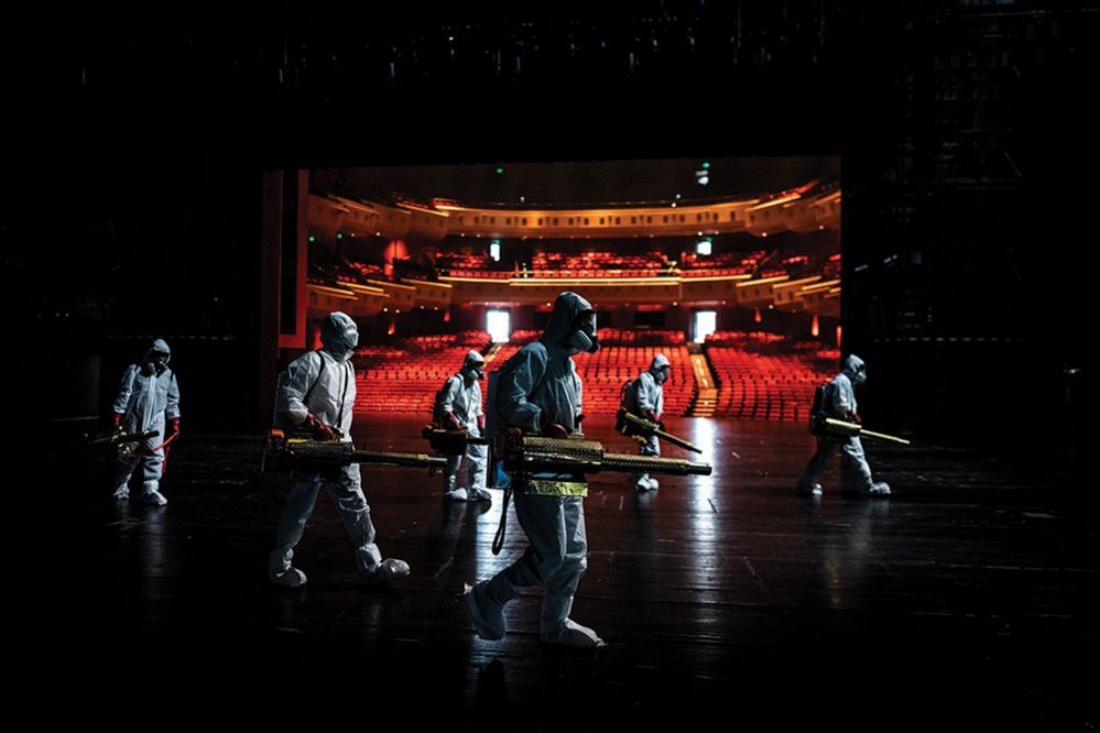 Volunteers disinfect the Qintai Grand Theatre, Wuhan