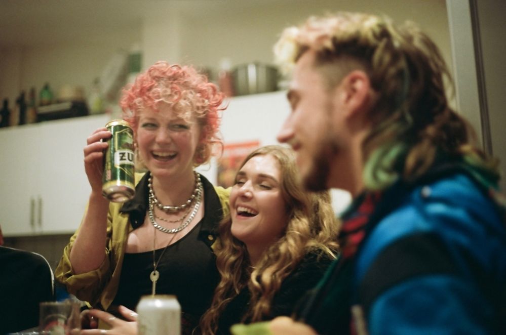 Students drinking in a flat