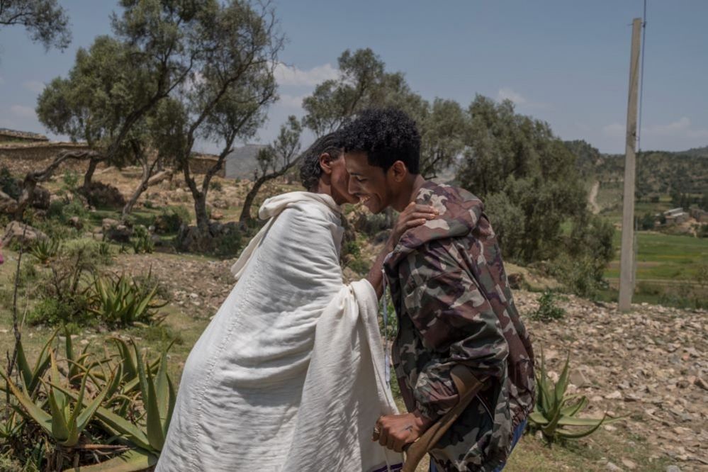 Kibrom Berhane (24) greets his mother, Ethiopia, 21 September 2023.