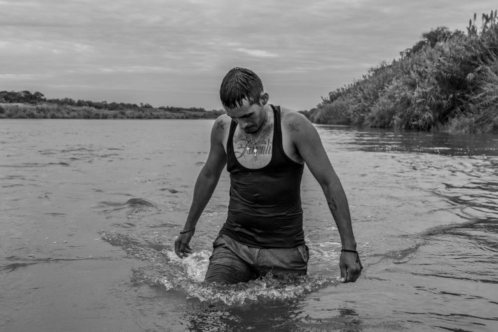 Carlos Mendoza, a Venezuelan migrant, crosses the Rio Grande river, Piedras Negras, Mexico, 7 October 2023