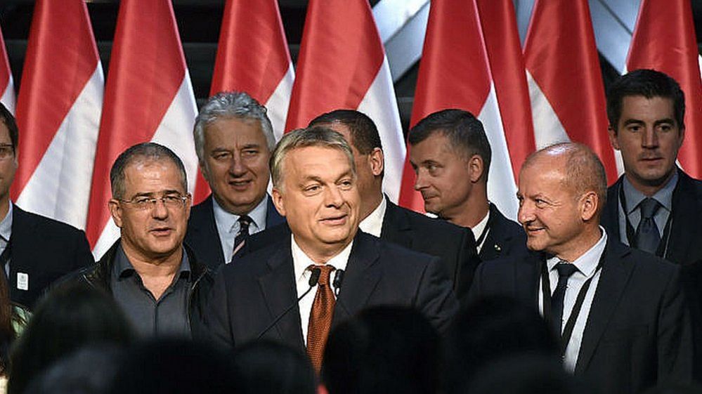 Hungarian Prime Minister Viktor Orban, centre, delivers speech after referendum in Budapest. October 2, 2016