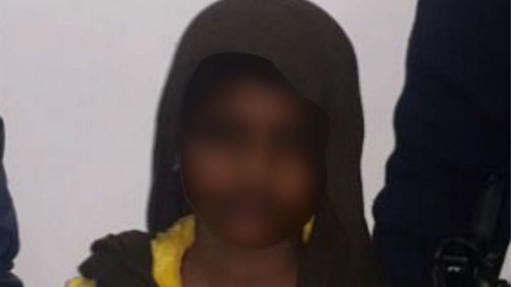 Blurred image of 10-year-old maid allegedly tortured by employer