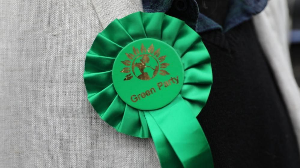 A Green Party rosette
