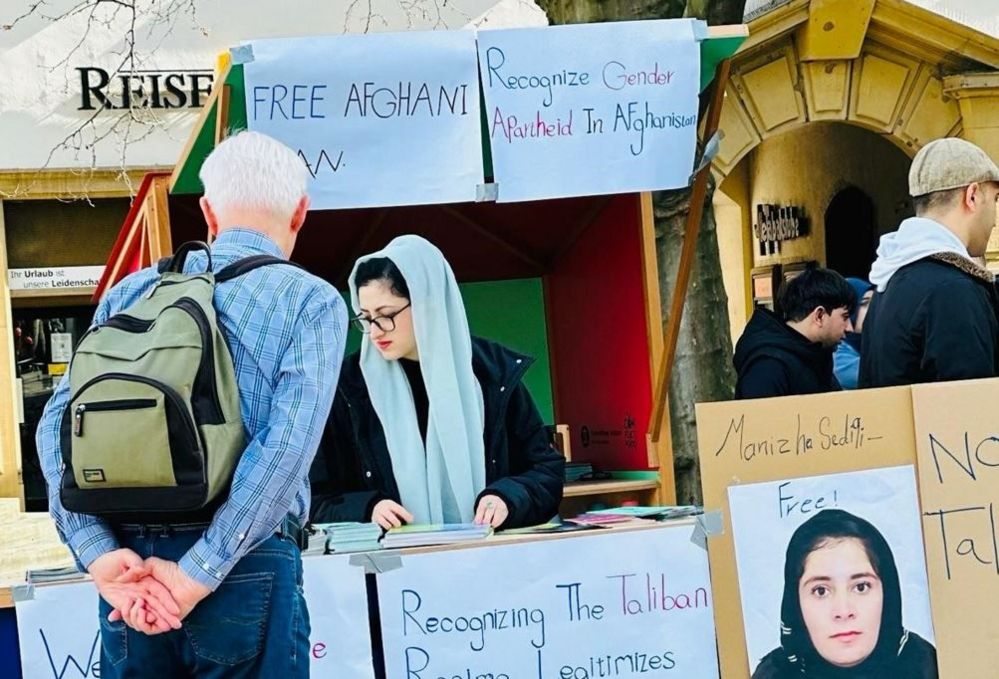 Parwana is seen manning a stall to campaign about Afghan women's freedom