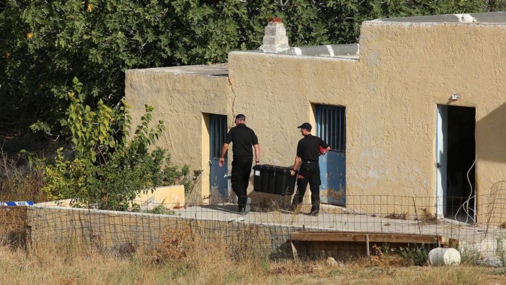 Police forensic officers in Kos