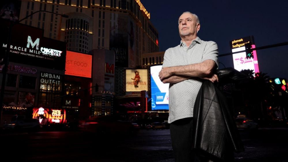 Jeff German poses for a photo on the Las Vegas strip