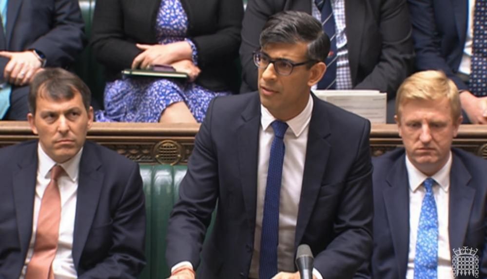 Rishi Sunak wearing suit and tie speaking from the despatch box in the House of Commons 