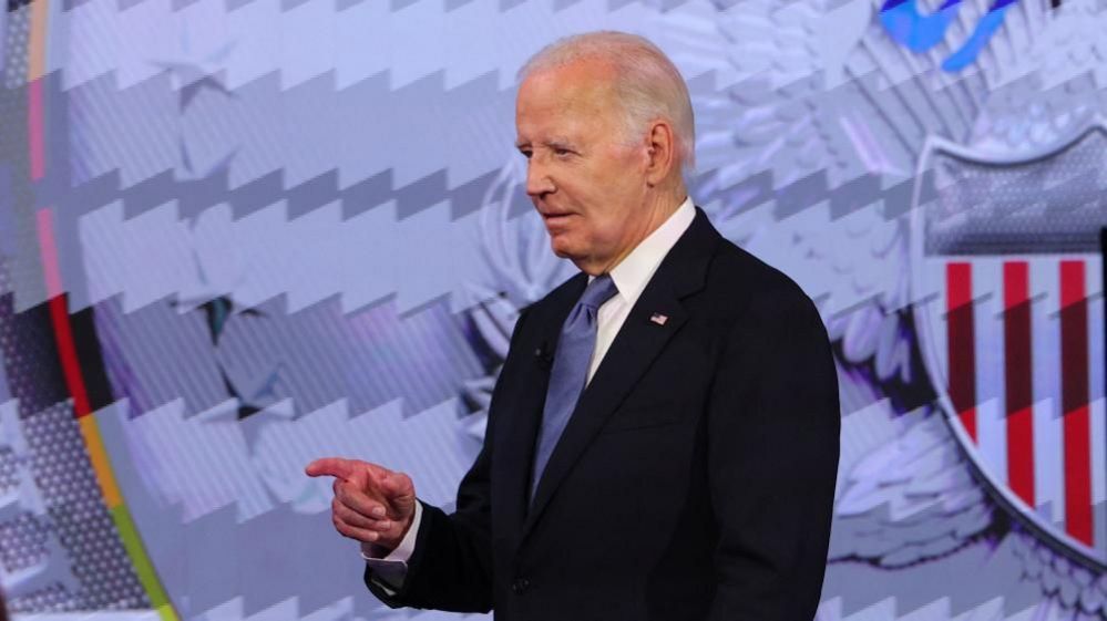 Joe Biden takes the stage at a presidential debate with Republican candidate Donald Trump, in Atlanta, Georgia, on 27 June, 2024 