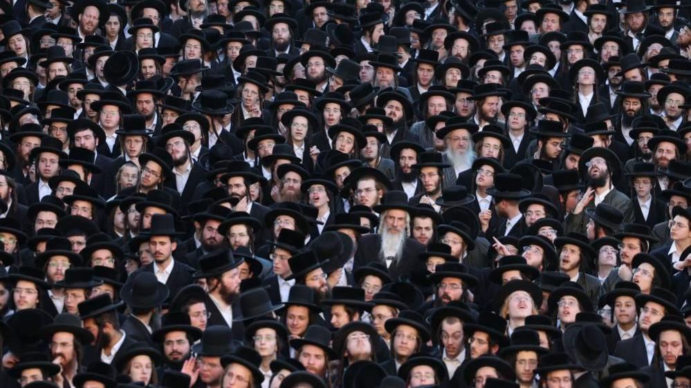 Thousands of ultra-Orthodox Jews protest against the new army recruitment law, in Jerusalem