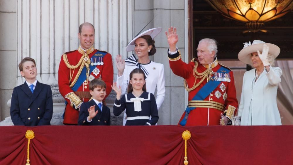 Britain's Prince George, Prince Louis, William Prince of Wales, Princess Charlotte, Catherine Princess of Wales, King Charles III and Queen Camilla wave to the crowd on the balcony of Buckingham Palace following the annual Trooping the Colour parade in London, Britain, 15 June 2024