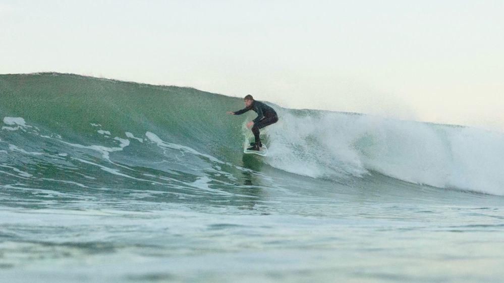 Daniel McAleese surfing