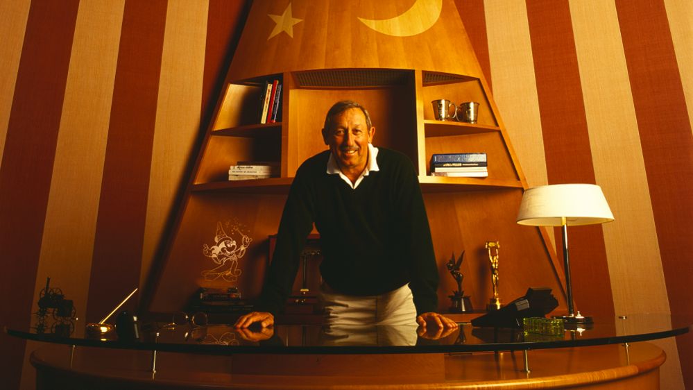 Roy E. Disney stands in an office space