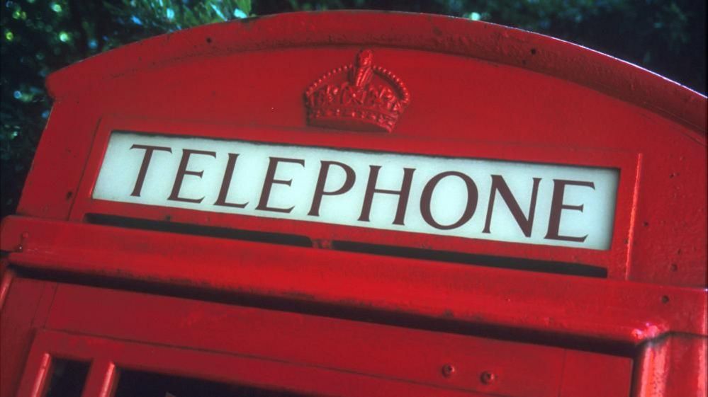 Top of a red public telephone box