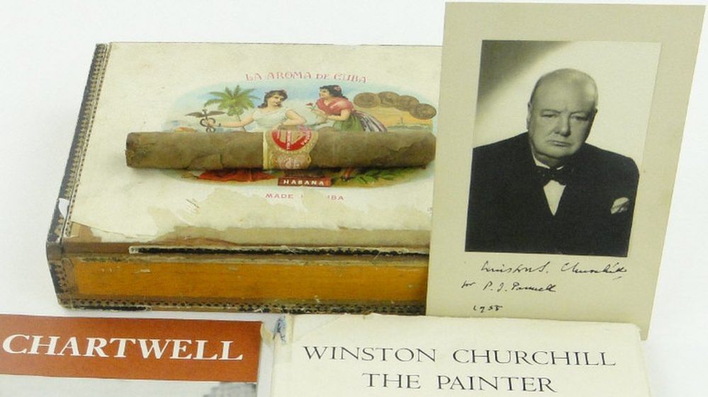 Unsmoked cigar, signed photograph and other items up for auction