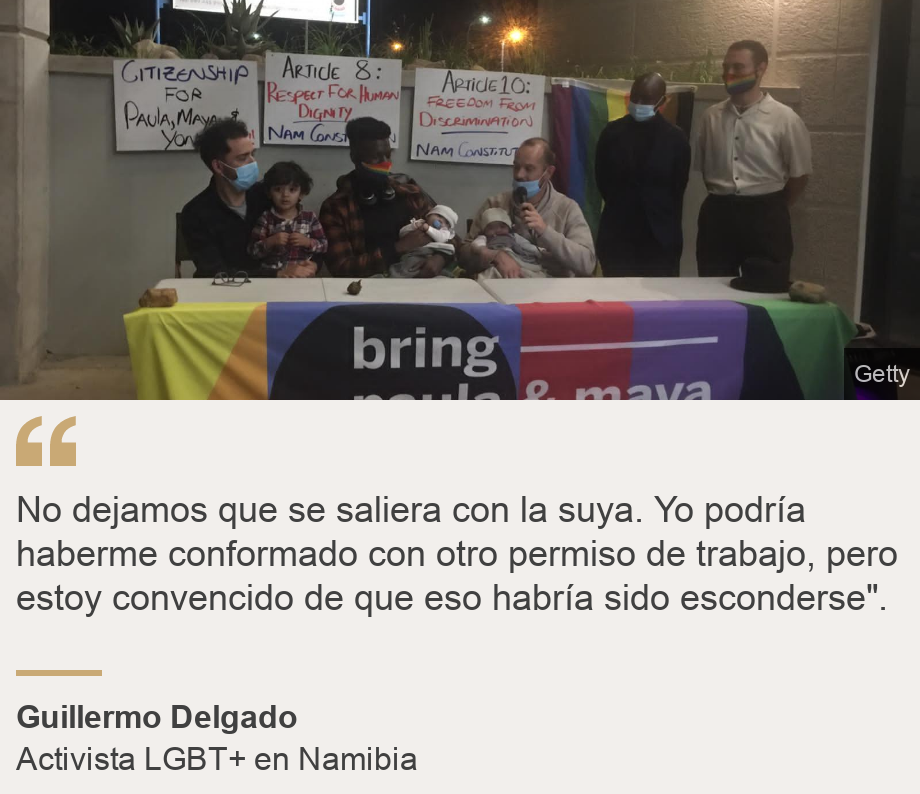 "No dejamos que se saliera con la suya. Yo podría haberme conformado con otro permiso de trabajo, pero estoy convencido de que eso habría sido esconderse". ", Source: Guillermo Delgado, Source description: Activista LGBT+ en Namibia, Image: La pareja haciendo activismo en Namibia. 