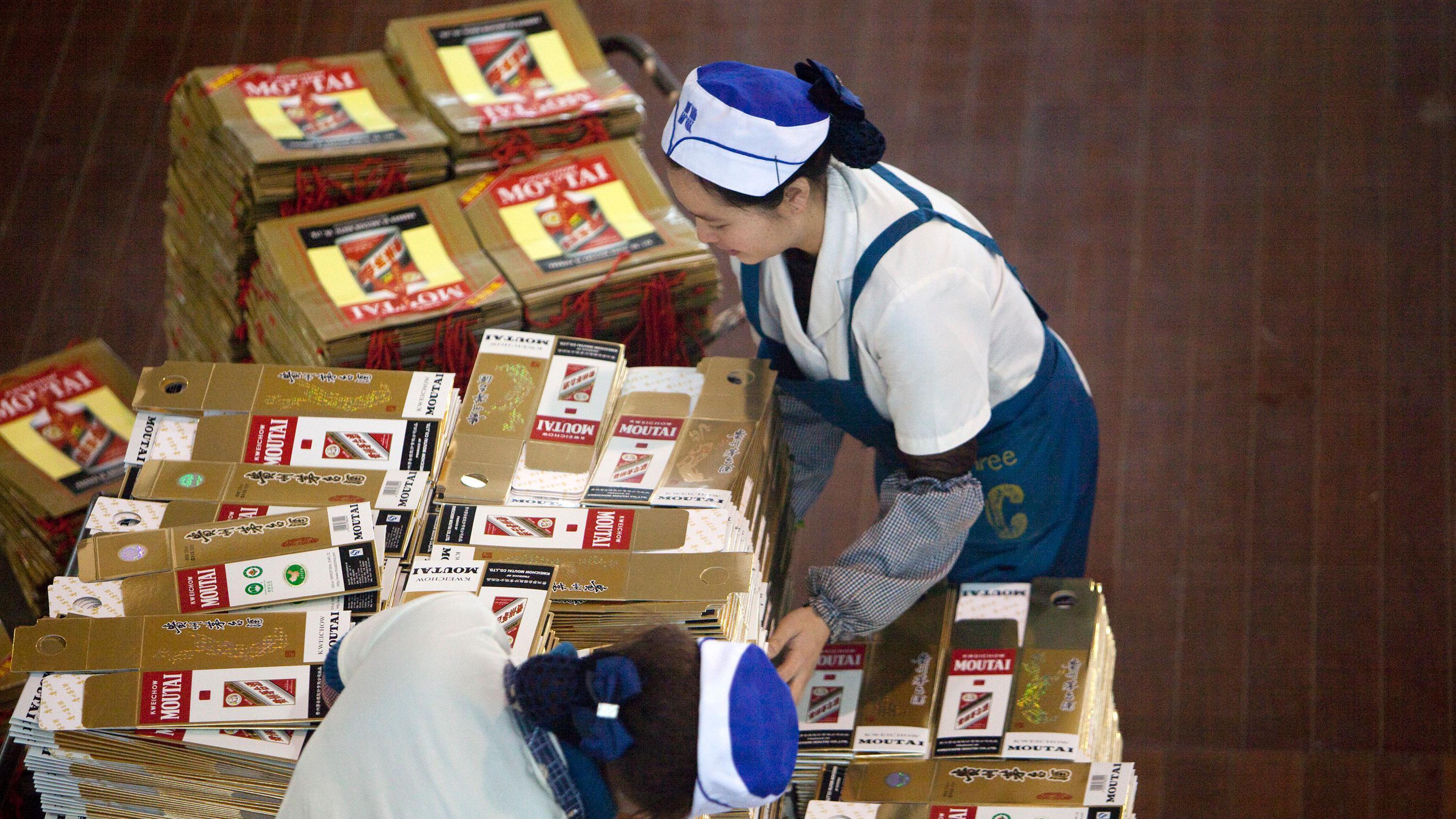 Packaging for China Kweichow Moutai Distillery Co. baijiu liquor is sorted at the company's facility in the Maotai section of the Renhuai District in Zunyi, Guizhou Province