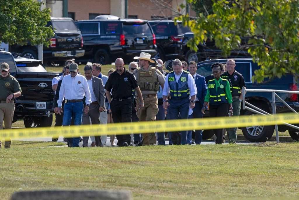 Boy, 14, arrested after four killed in Georgia school shooting