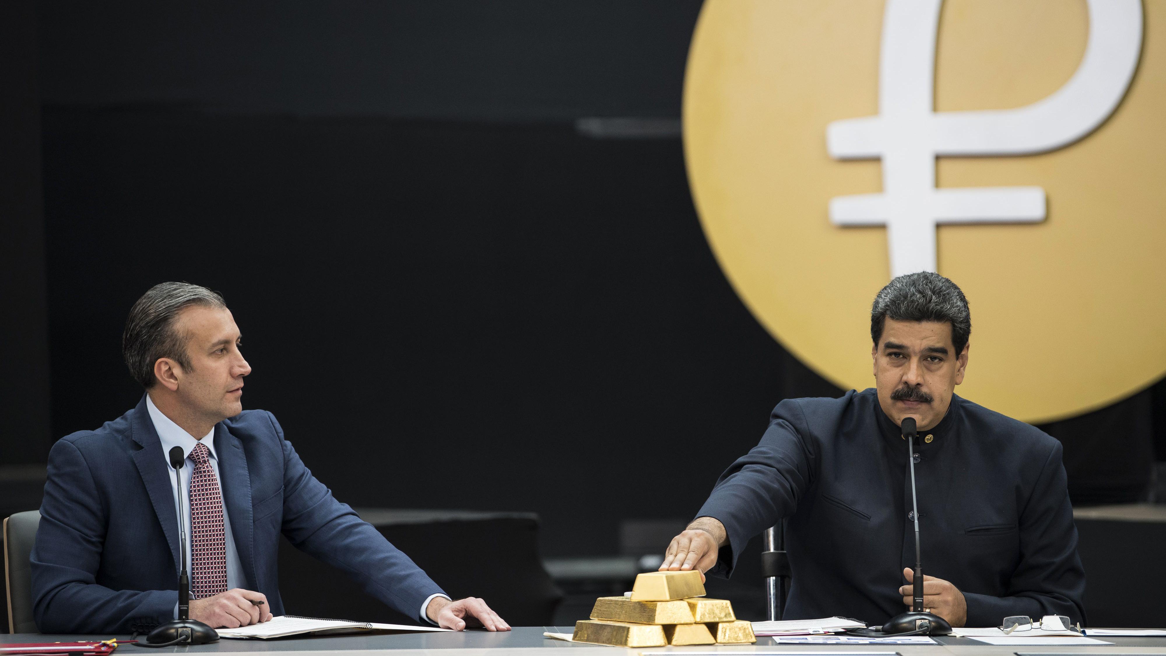 Tareck El Aissami y Nicolás Maduro