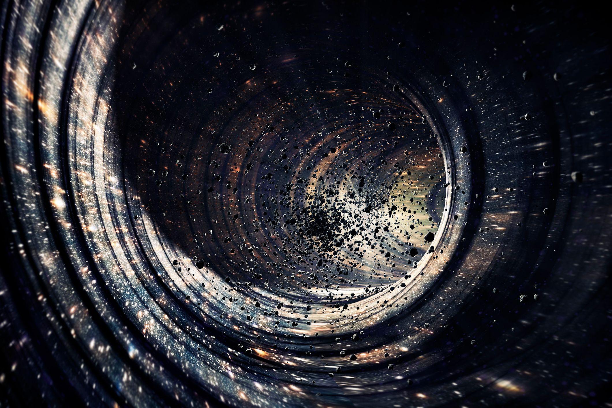 Una ilustración de un agujero negro devorando una galaxia