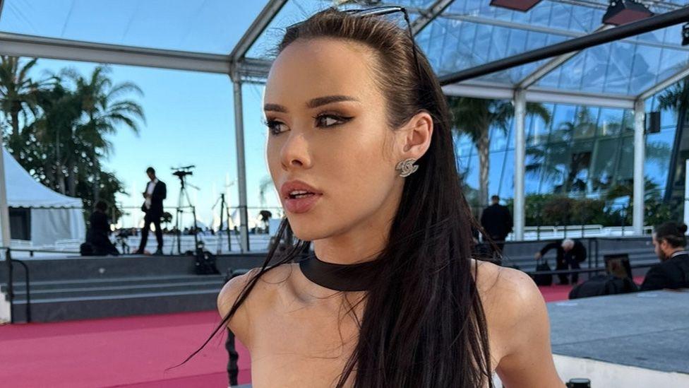 Model sues over Cannes red carpet assault