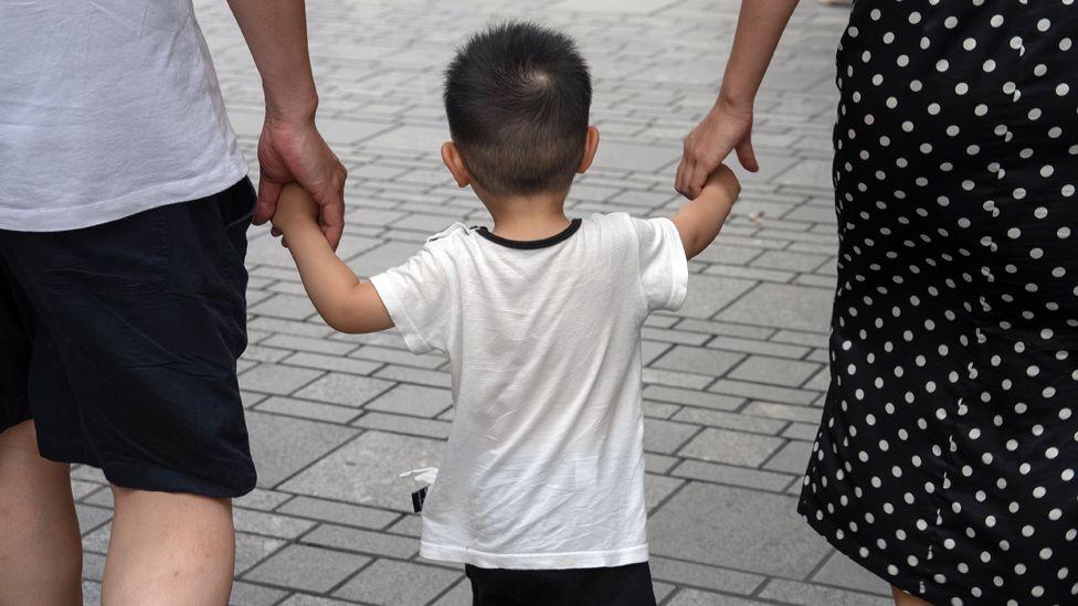 Uncertainty for families as China ends foreign adoptions