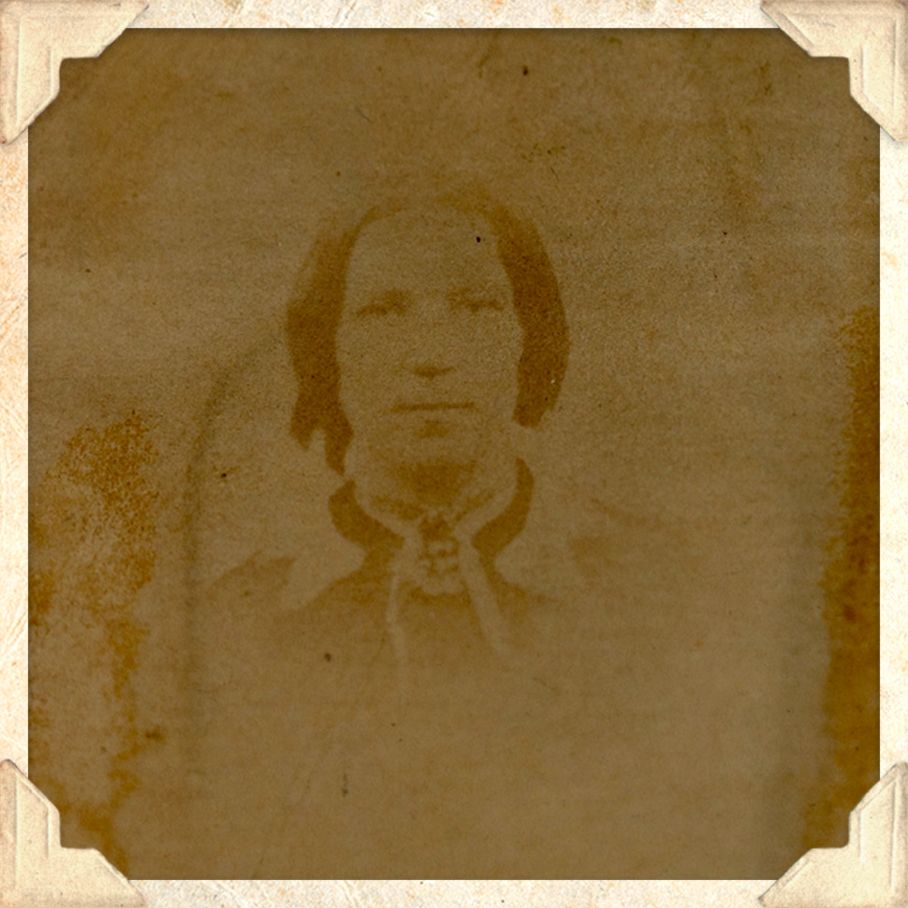 A faded photograph of a woman believed to be Marian Meanwell's mother.