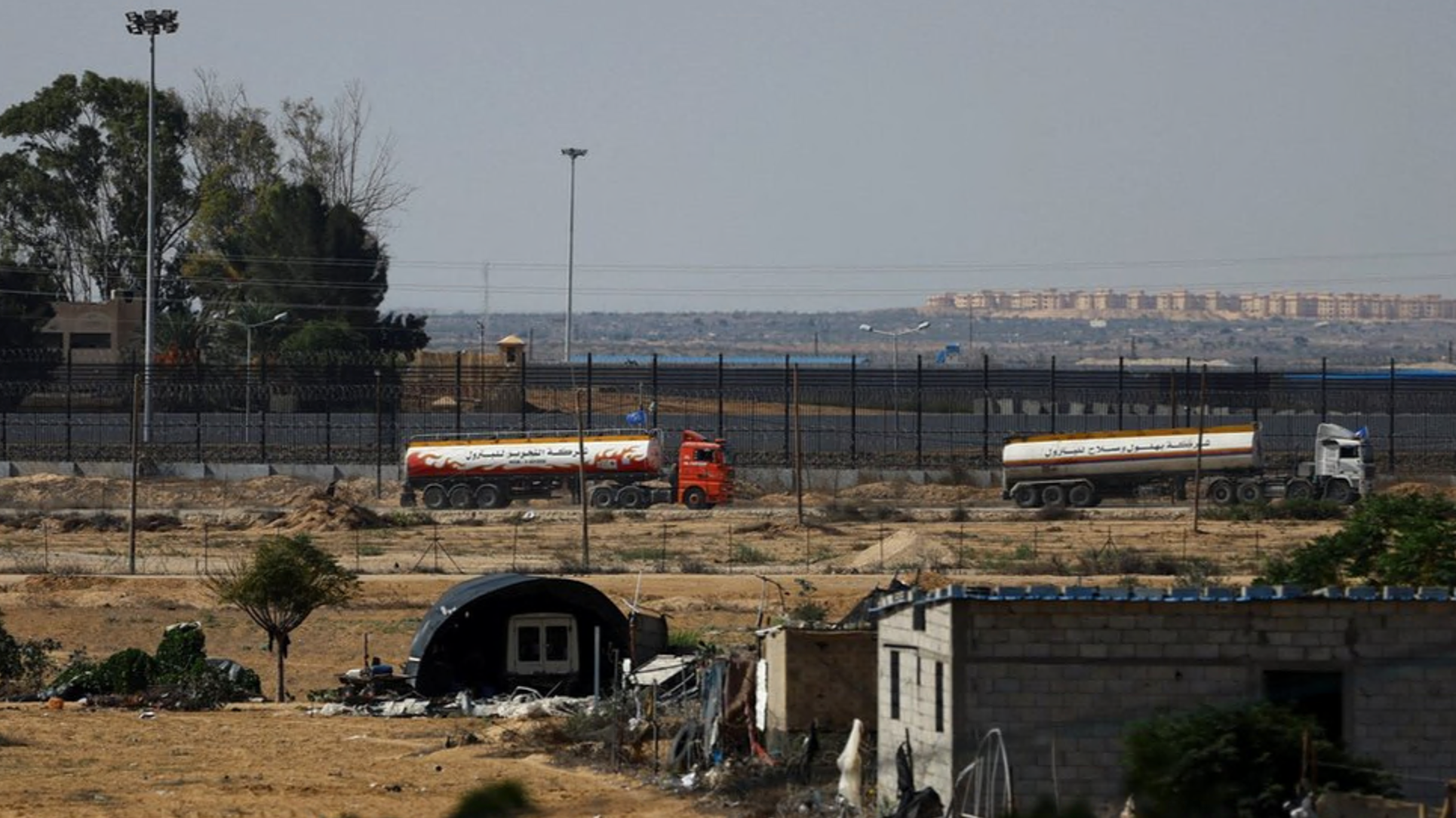 UN-flagged fuel trucks move towards the Rafah border crossing in the southern Gaza Strip, on 16 October 2023 