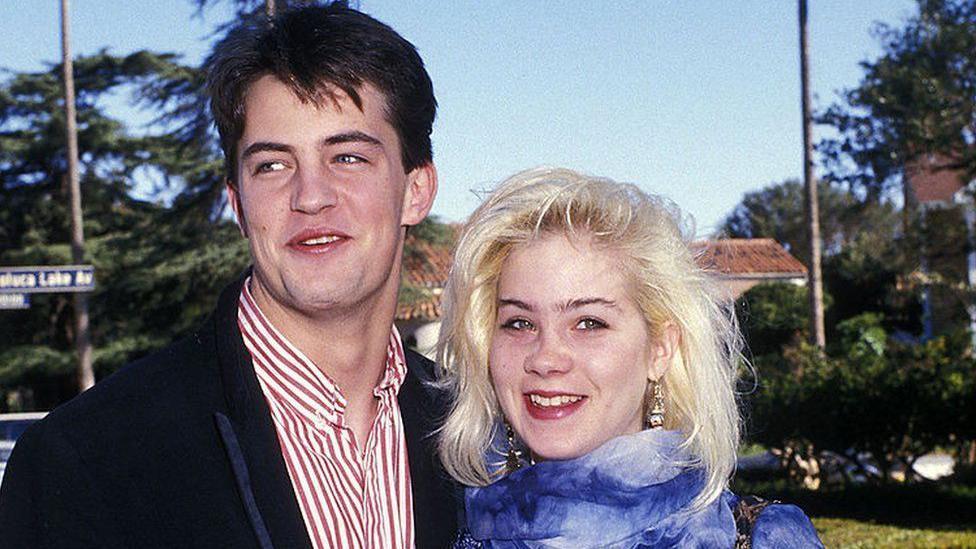 Perry con Christina Applegate en 1988.