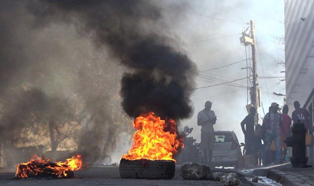 Tyres burn on the streets of Port-au-Prince