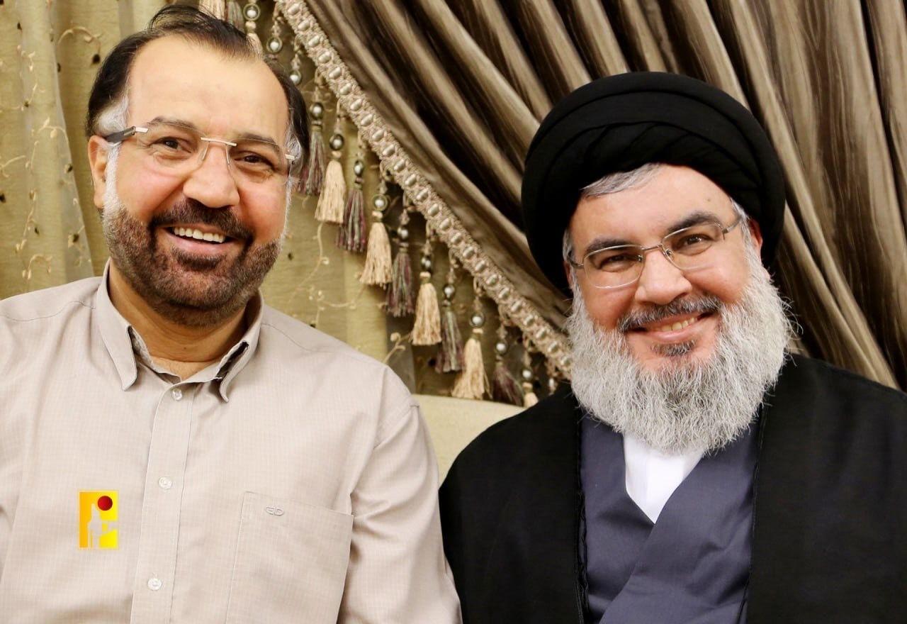 صورة للأمين العام لحزب الله اللبناني حسن نصر الله وفؤاد شكر 