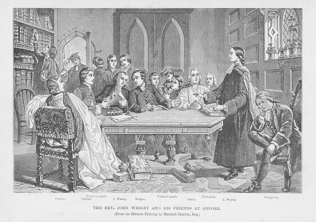 Ilustração de John Wesley sentado com amigos, incluindo o irmão Charles, ao redor de uma mesa na Universidade de Oxford, por volta de 1725