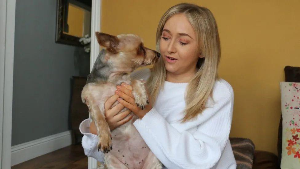 Hannah Poowell with her dog, Jess