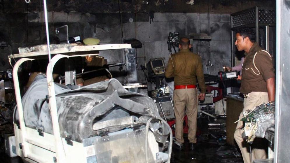 Parents grabbed any child they could save from Indian hospital fire