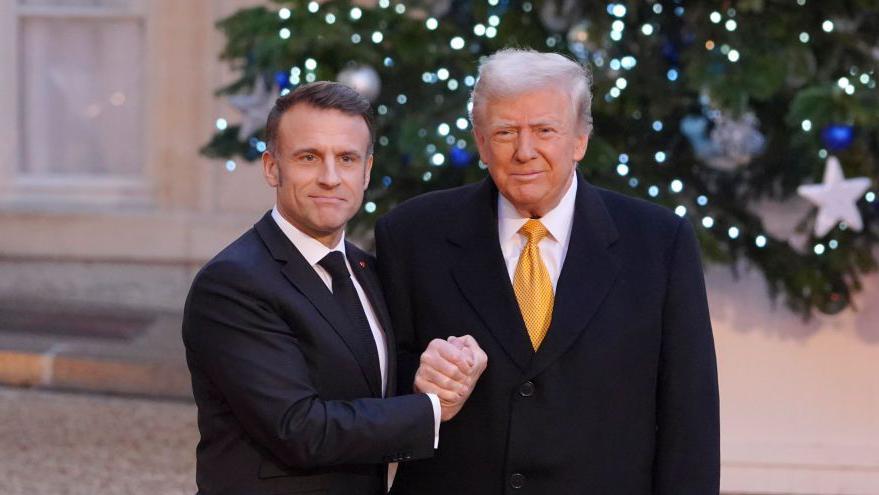 Donald Trump con el presidente francés Emmanuel Macron.