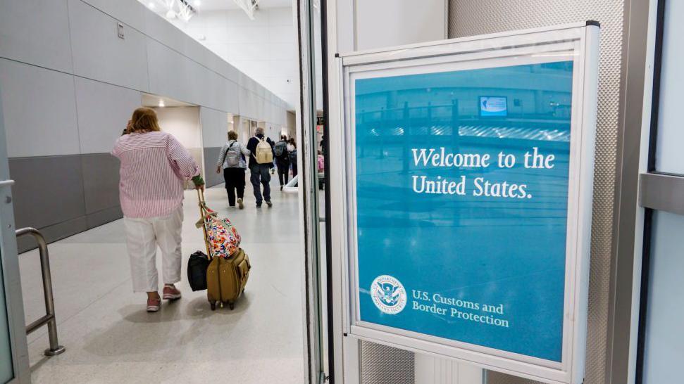 Miami, Florida, MIA Miami International Airport, terminal welcome sign US Customs and Border Protection