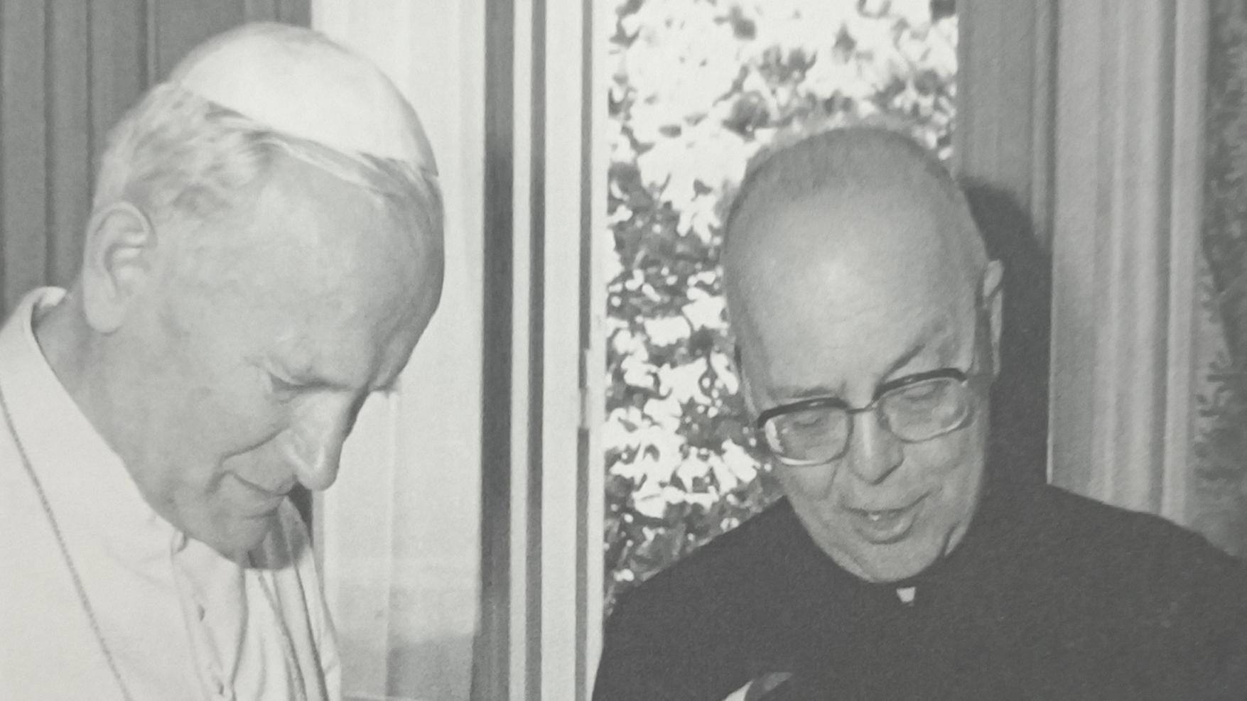 Pope John Paul II (left) and Father Amorth