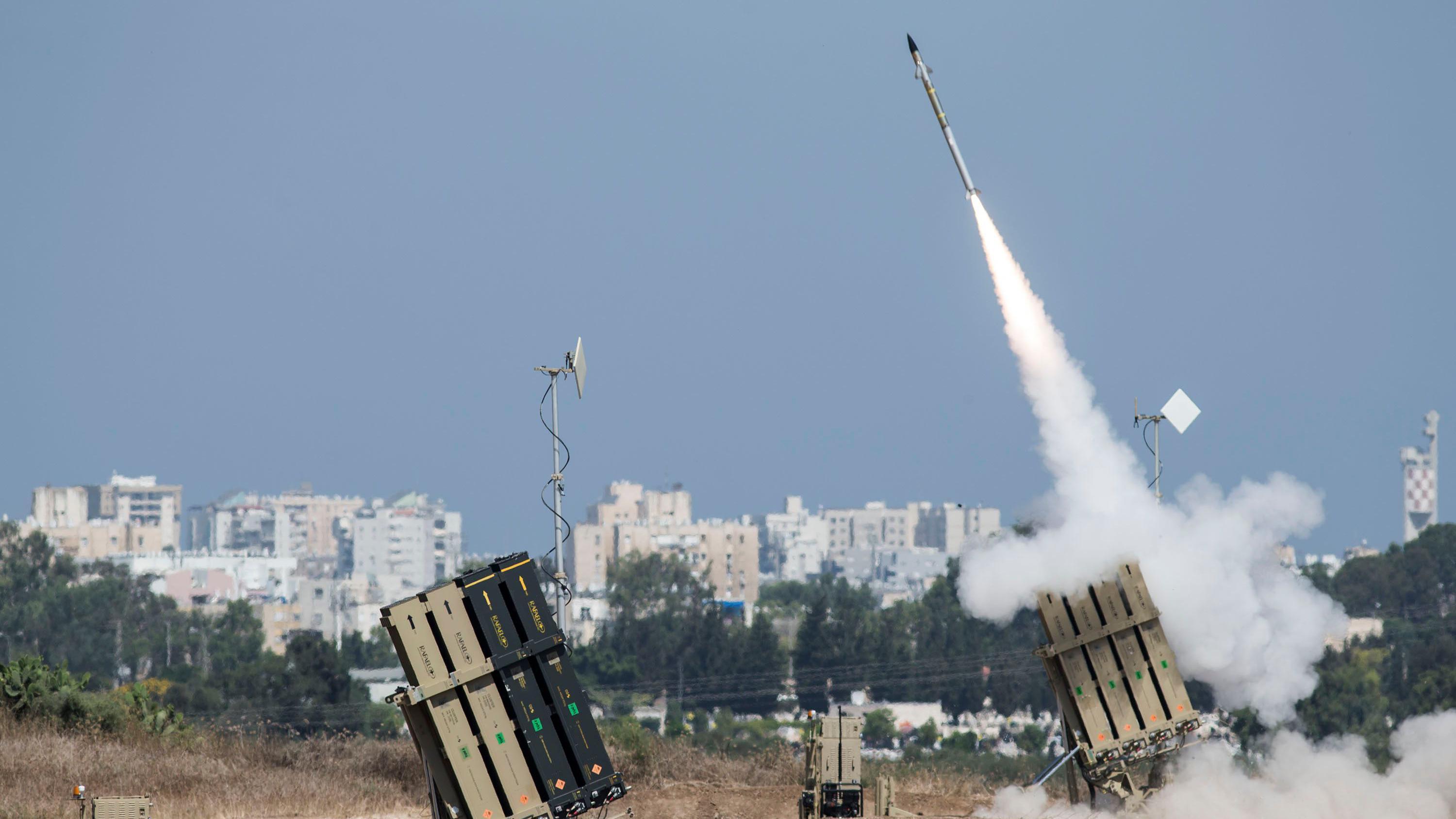 Iron Dome missiles being fired