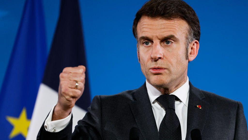 France's President Emmanuel Macron gestures as he addresses the media during a press conference at the end of a Special European Council to discuss continued support for Ukraine and European defence at the EU headquarters in Brussels on March 6, 2025. 