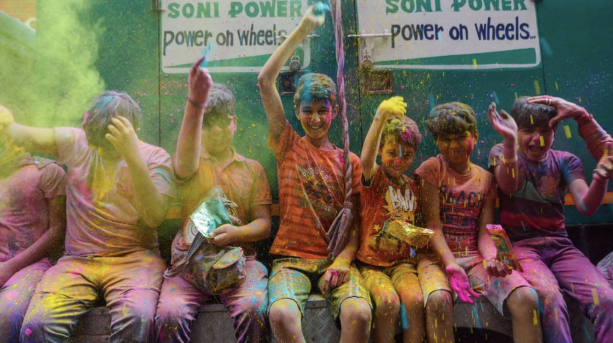 Children are seen celebrating the festival of Holi