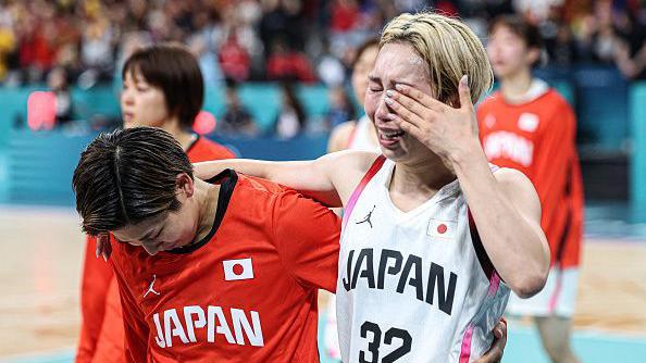 Atleta japonesa chora após derrota