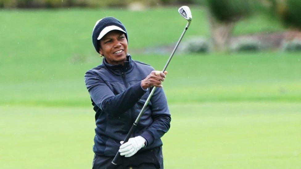 Condoleezza Rice jogando golfe