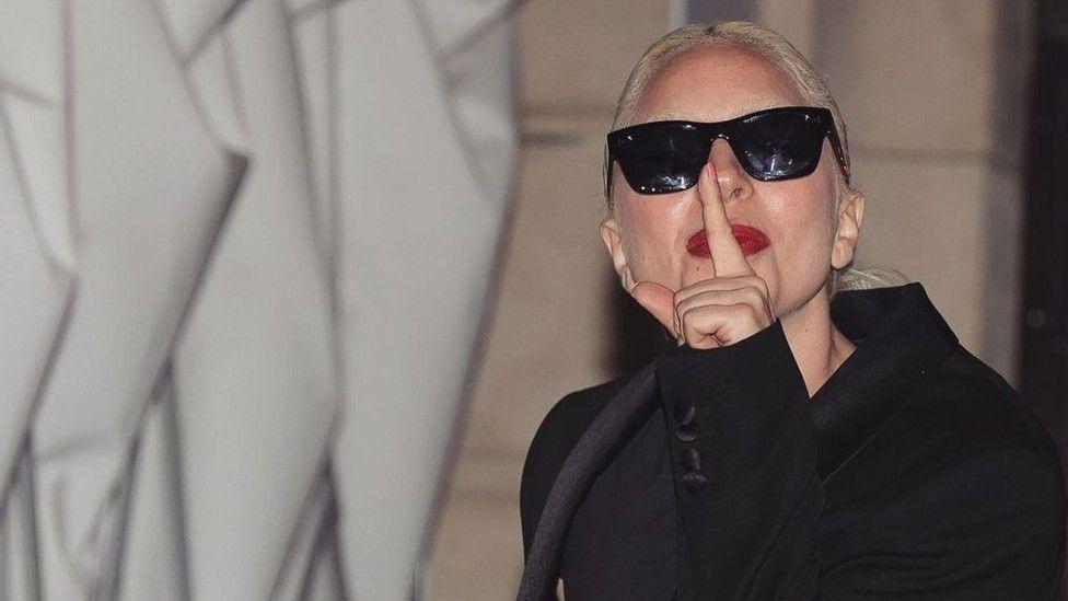 Lady Gaga plays new music on the streets of Paris