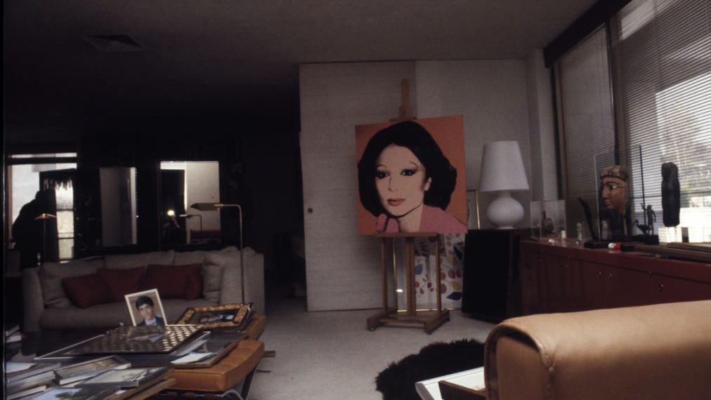 Andy Warhol's portrait of Farah Pahlevi on display in the library of her former residence at the Niavaran Palace, Tehran, 23rd December 1979. The palace complex is now a museum.