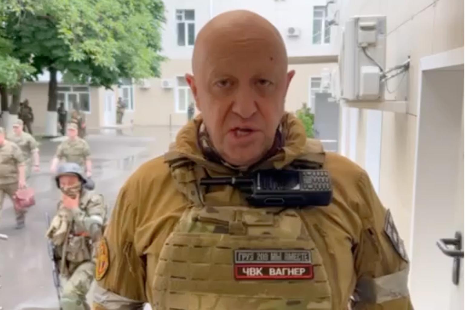 A screengrab from a video which shows Wagner chief Yevgeny Prigozhin making a speech at the Headquarters of the Southern Military District, surrounded by fighters in Rostov-on-Don, Russia on 24 June, 2023