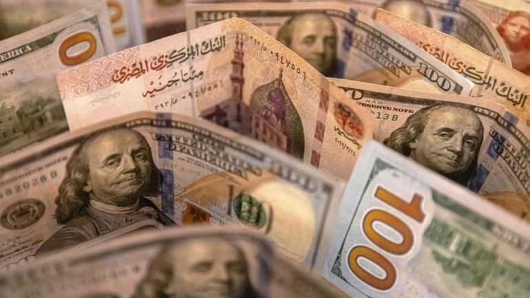 الجنيه المصري بجانب الدولار