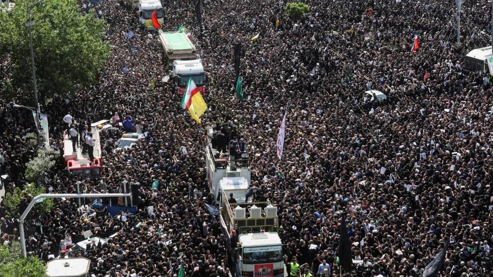 Irans supreme leader leads prayers at Raisi funeral